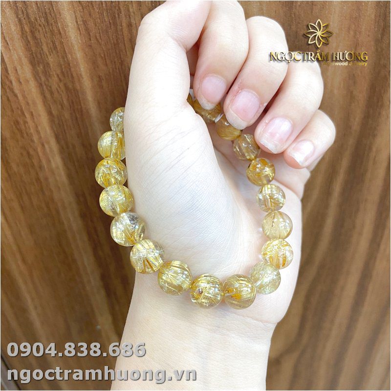 Vòng tay đá thạch anh tóc vàng Vòng tay đá thạch anh tóc vàng 10 li (1)