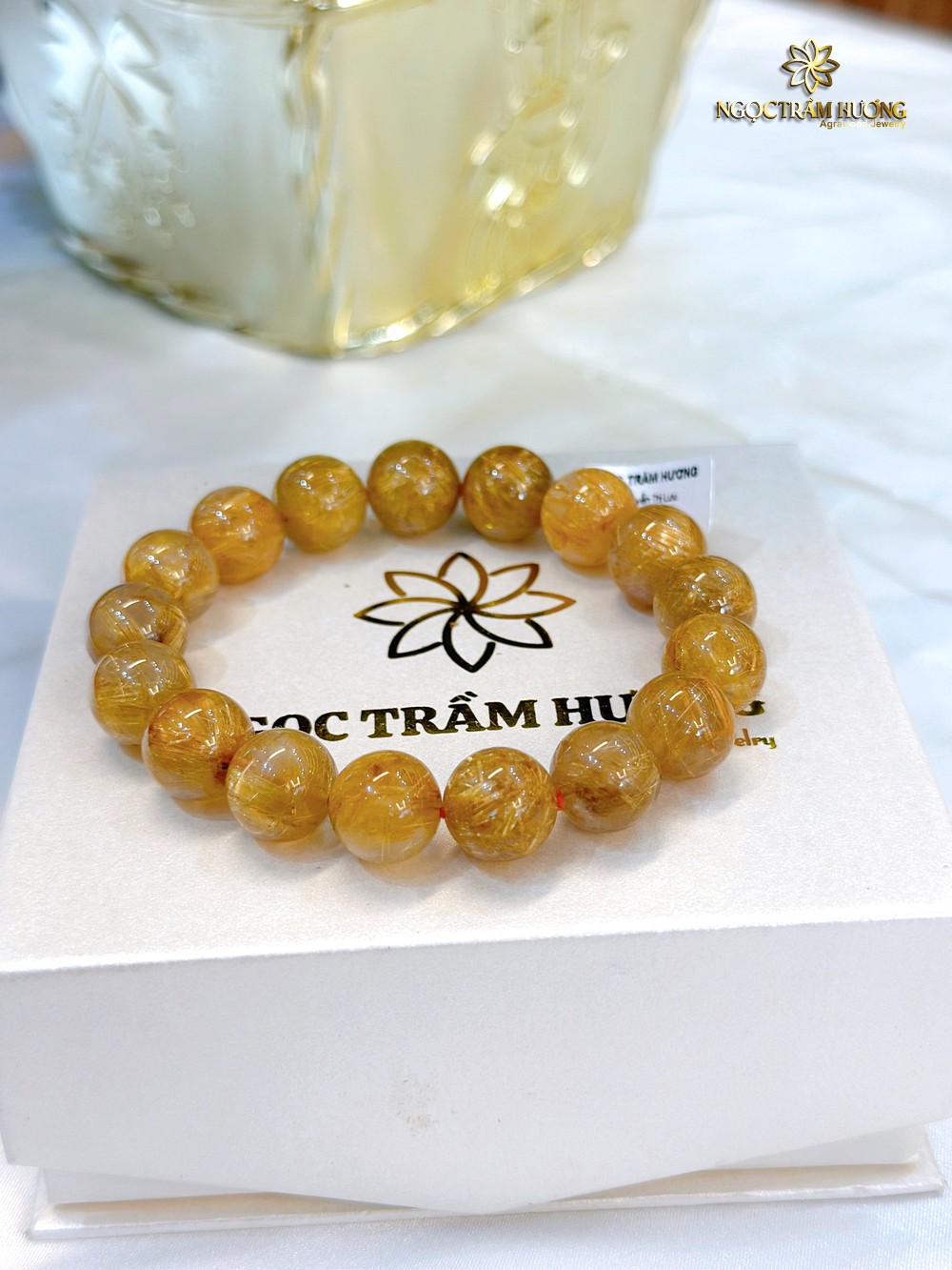 Vòng tay đá thạch anh tóc vàng 14li (VIP) Vòng tay đá thạch anh tóc vàng 14li (VIP)