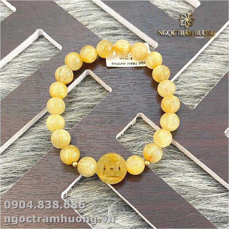Vòng tay thạch anh tóc vàng 8 li mix charm (2)