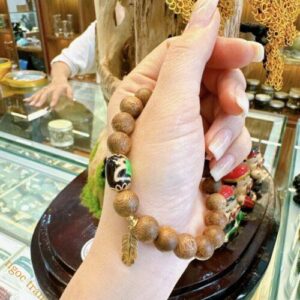 Vòng trầm tốc Việt Nam mix Dzi và charm vàng 24k – Tịnh Agarwood